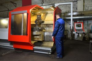 machine operator working on a CNC machine