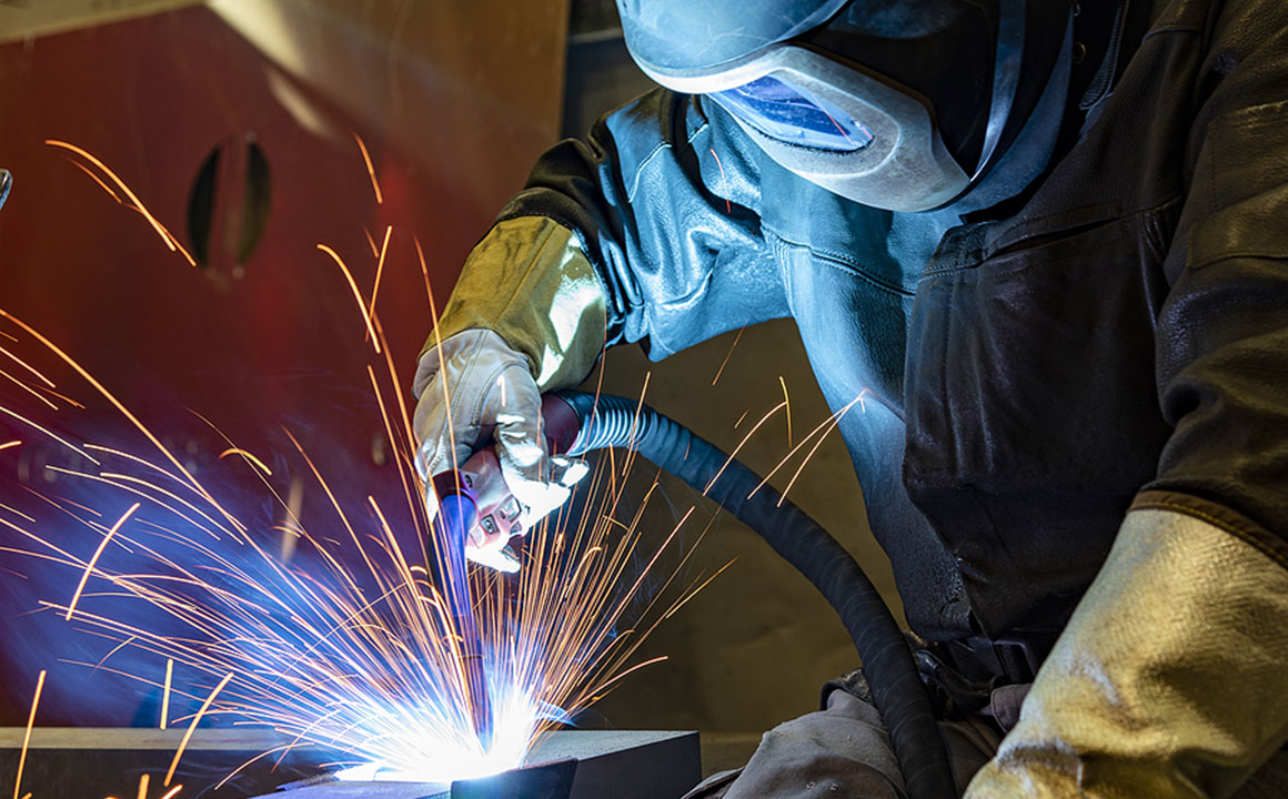 Welder technician helping move production along