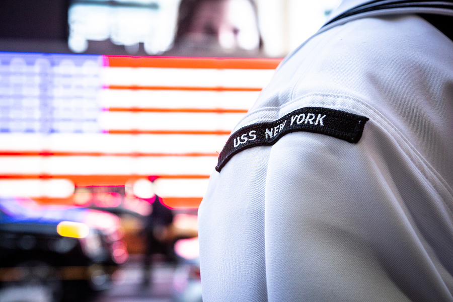 MAY 22 2019-NEW YORK: U.S. Navy Sailor from the USS New York stands at the Armed Forces Recruiting Station on the Military Island Plaza in Times Square during Fleet Week in Manhattan on May 22, 2019.