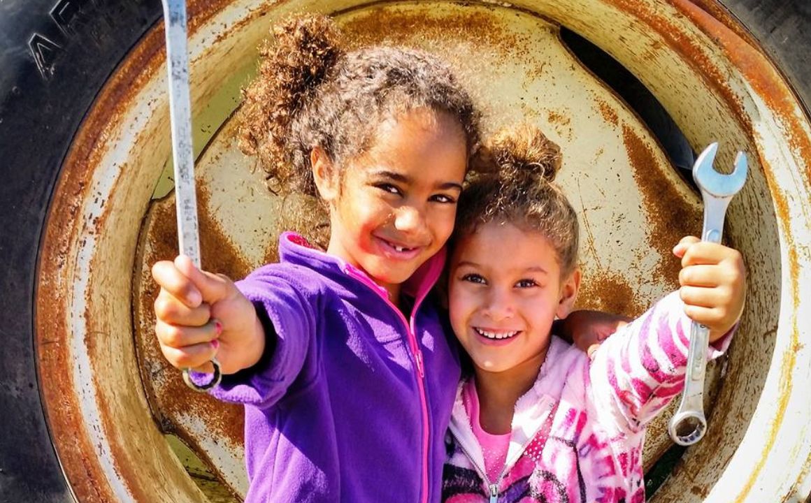 International Day of the Girl Child 2 young girls holding wrenches